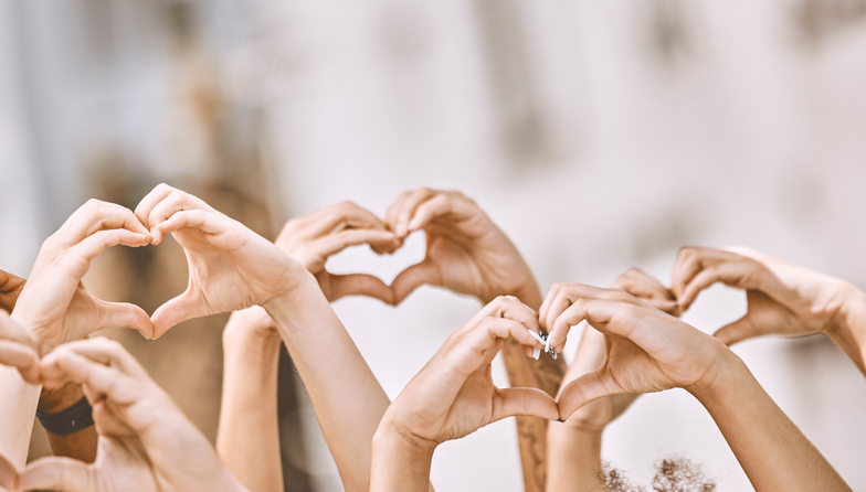 Heart sign, hands in air and peace for love, solidarity and have hope together for humanity. Community, hand gesture in air and being loving for collaboration, people equality and justice in society.
