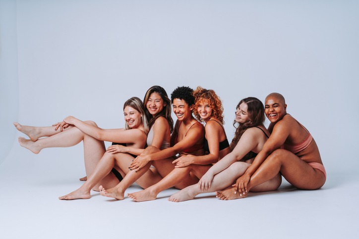 Beautiful diverse women wearing lingerie posing for body positive concepts - Multiethnic group of female adults celbrating body acceptance, diversity, self-esteem